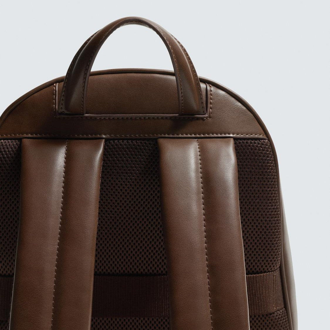 Smooth Brown Minimalist Backpack with Front Zip Pocket and Luggage Strap