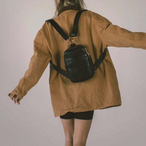 Black Compact Convertible Mini Backpack with Wipe Access and Multi-Compartment Storage