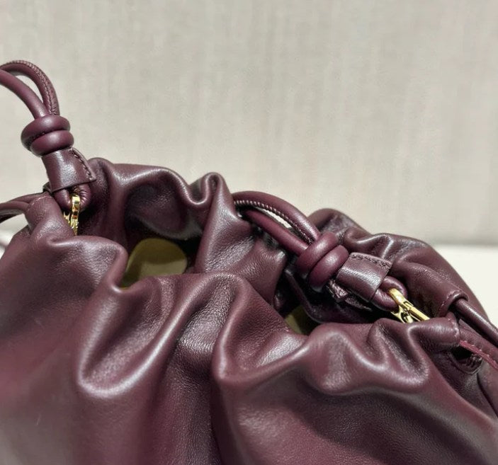 Burgundy Ruched Pouch Bag with Gold-Tone Chain Strap and Knotted Drawstring Detail
