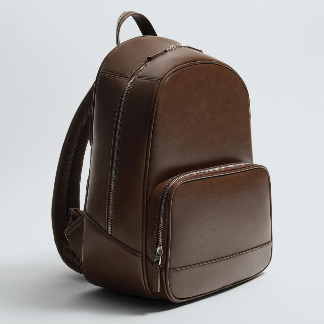 Smooth Brown Minimalist Backpack with Front Zip Pocket and Luggage Strap